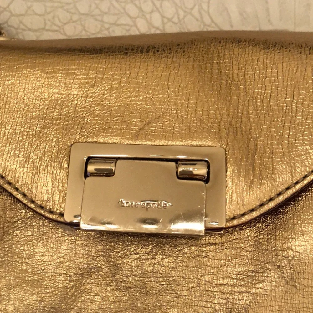 Kate Spade gold wristlet